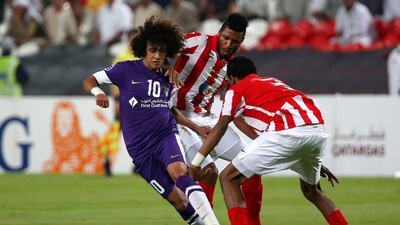 Omar Abdulrahman, the Al Ain playmaker, left, will likely enjoy some respite from the change in schedule. Marwan Naamani / AFP