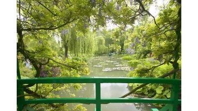 Above, the garden at Monet's house in Giverny. Right, the river at Argenteuil as painted by Monet in 1875. Getty Images / Visions of America / Joe Sohm