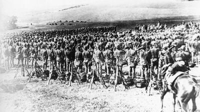 Troops are mobilized on the bank of the Danube River across from Belgrade.