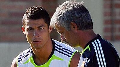 Jose Mourinho, right, has not given up hope of using Cristiano Ronaldo in tonight's clash with Tottenham Hotspur.