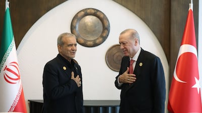 Iranian President Masoud Pezeshkian, left, and Turkish counterpart Recep Tayyip Erdogan at an Economic Co-operation Organisation summit in Khankendi, Azerbaijan in July 2025. Anadolu via Getty Images