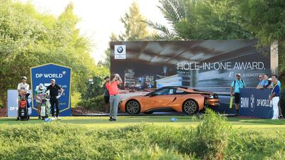 Jon Rahm tees off on the 17th green. Getty