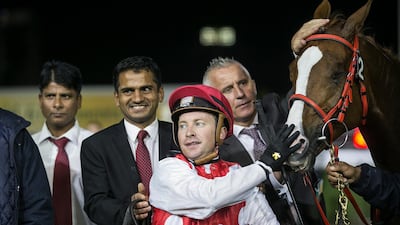 Jockey Tadhg O'Shea with RB Torch after a victory at the Abu Dhabi Equestrian Club in January 2017. Mona Al Marzooqi / The National