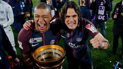 Kylian Mbappe and Edinson Cavani celebrate after beating Monaco in the 2018 French League Cup final. AP