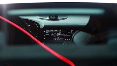 A dashboard touchscreen information display sits inside the all electric Porsche AG Taycan luxury automobile. Bloomberg
