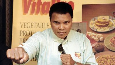 Muhammad Ali shown at a press event in Jakarta, Indonesia in 1996. John MacDougall / AFP