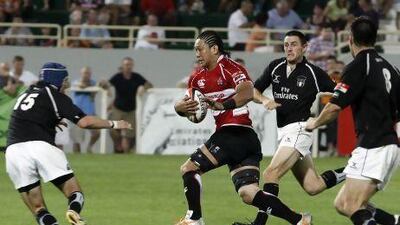 The last time UAE played Japan, home conditions mattered little as Takashi Kikutani, centre, and his teammates won 111-0. Jeffrey E Biteng / The Nationala