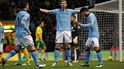 Edin Dzeko, often used as an impact player this season by Manchester City, scored twice after being asked to start against Norwich City this weekend. Ian Kington / AFP