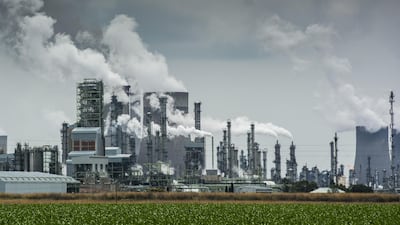 Emissions rise from towers of a coal-to-liquids plant in Mpumalanga, South Africa, in December last year. Waldo Swiegers / Bloomberg