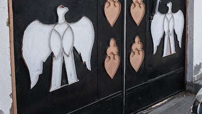 The UAE flag, falcons and stars and crescent moon images are a common choice when decorating doors