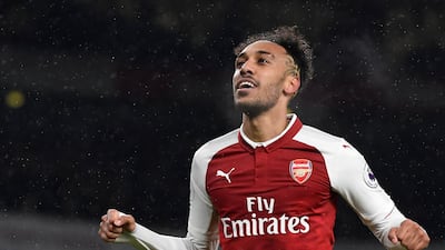 Pierre-Emerick Aubameyang celebrates scoring on his debut for Arsenal. Emirates will remain Arsenal's shirt sponsors until the end of the 2023-24 season. Tony O'Brien / Action Images via Reuters.