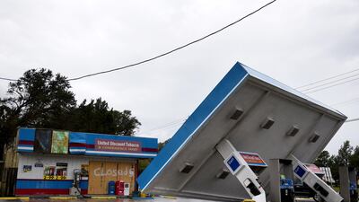 A gas station stands damaged during Tropical Storm Florence near Topsail, North Carolina. Bloomberg