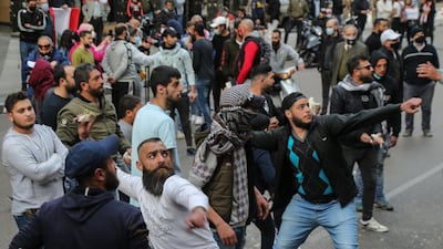 Anti-government protesters in Beirut vent their anger against power cuts, the high cost of living and the weak Lebanese pound. EPA