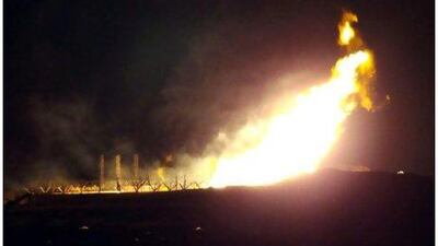 Flames rise from a gas pipeline in the Bir al Abd area, 80 kilometres from the northern Sinai town of El Arish, after it was bombed by saboteurs, cutting supplies to Israel and Jordan, early yesterday. AFP PHOTO/STR