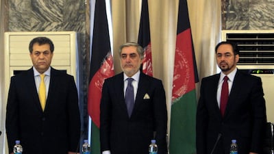 Afghan Chief Executive Officer Abdullah Abdullah (C) and newly inducted Minister of Foreign Affairs, Salahuddin Rabbani (R) talk with journalists during a press conference in Kabul, Afghanistan on February 2, 2015. Hedayatullah Amid/EPA