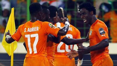 Wilfried Bony, right, celebrates his first goal during the Ivory Coast's African Cup of Nations quarter-final against Algeria. Amr Abdallah Dalsh / Reuters