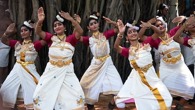 Students perform a traditional dance during Onam celebrations in Chennai. AFP