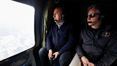 Antony Blinken and Turkish Foreign Minister Mevlut Cavusoglu on a helicopter tour of earthquake-stricken areas in Turkey on Sunday. Reuters