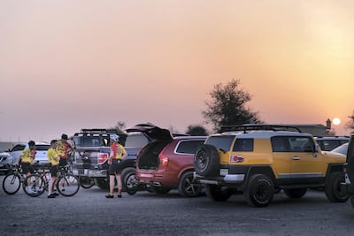 Cycling outdoors in the summer entails getting up and out before the sun rises. Reem Mohammed / The National