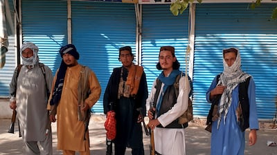 Taliban fighters are seen in Kunduz city, northern Afghanistan. AP Photo