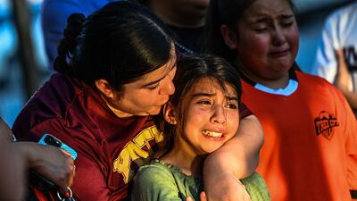 Texas police faced angry questions over why it took an hour to stop the gunman who murdered 19 children and two teachers in Uvalde, as video emerged of desperate parents begging officers to storm the school. AFP