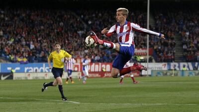 Antoine Griezmann controls the ball during Atletico Madrid's 2-0 La Liga win over Real Sociedad on Tuesday night. Daniel Ochoa de Olza/ AP / April 7, 2015