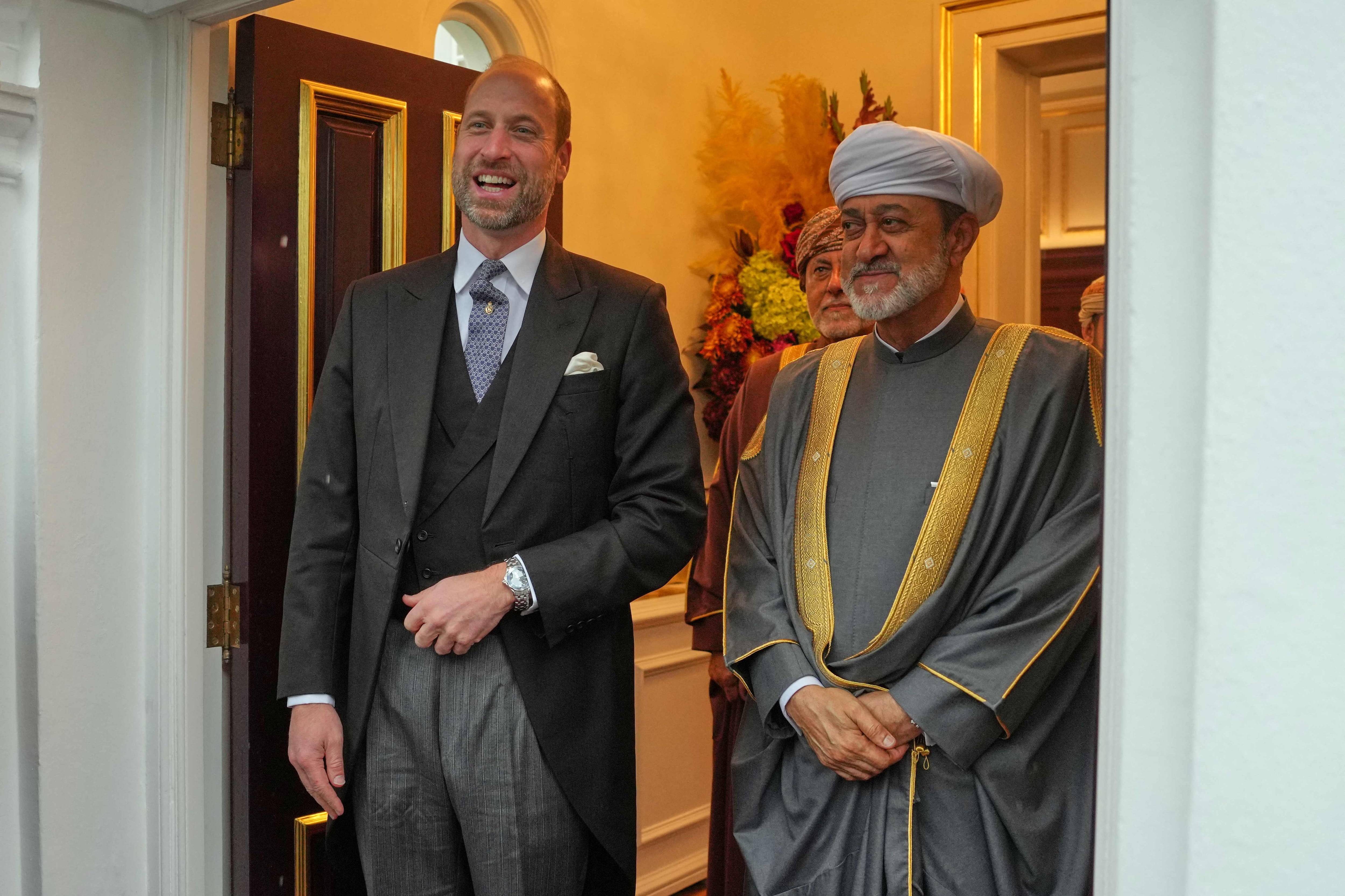 Prince William and Sultan Haitham leave the Sultan's residence in London. AFP
