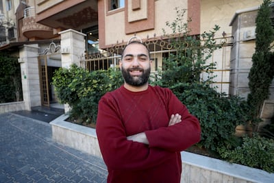 Mohammad Abu Hasira, 23, in his office in Gaza City, is still waiting for approval. Majd Mahmod for The National