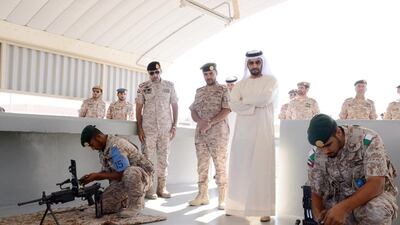 Sheikh Hamdan watches training procedures. Courtesy Wam
