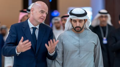 Sheikh Hamdan bin Mohammed, Crown Prince of Dubai, speaks with Fifa president Gianni Infantino on the sidelines of the World Sports Summit in Dubai. Photo: Dubai Government Media Office