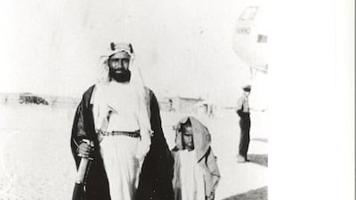 Sheikh Sultan bin Saqr Al Qasimi stands under one of the wings of the Hanno after the plane made its arrival.