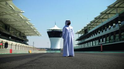 Ahmed Hilal Al Kaabi, the Yas Marina Circuit’s head of Government affairs, surveys the track ahead of this weekend’s Abu Dhabi Grand Prix, which requires a team of hundreds of staff to successfully operate. Christopher Pike / The National