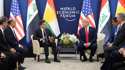 US President Donald Trump speaks with President of the Kurdistan Regional government (IKRG) Nechirvan Barzani during a meeting at the World Economic Forum in Davos. AFP