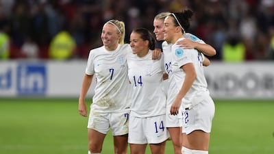 Beth Mead, Fran Kirby, Alessia Russo and Lucy Bronze pose for a photo after the win. EPA
