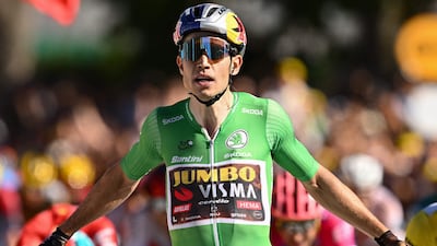 Jumbo-Visma team's Belgian rider Wout Van Aert celebrates winning the stage. AFP