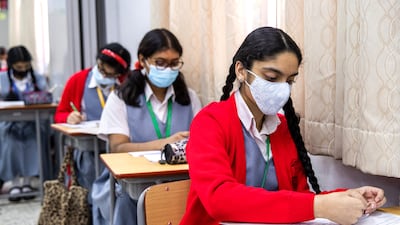 Pupils attend class at St Joseph’s school in Abu Dhabi. Victor Besa / The National