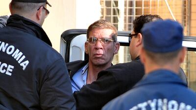 Seif Al Din Mohamed Mostafa, an Egytpian man who hijacked an EgyptAir passenger plane to Cyprus, arrives at the court in Larnaca on March 30, 2016, a day after the incident. George Michael / AFP
