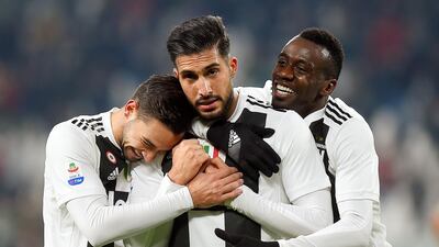 Emre Can is congratulated by teammates. Reuters