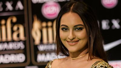 Indian Bollywood actress Sonakshi Sinha poses on the green carpet as she arrives to the 17th edition of IIFA Awards (International Indian Film Academy Awards) in Madrid on June 24, 2016. AFP / CESAR MANSO