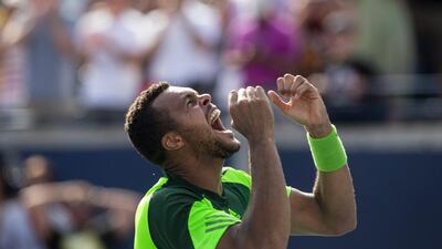 France's Jo-Wilfried Tsonga celebrates after beating Switzerland's Roger Federer 7-5, 7-6 to win the Rogers Cup singles final in Toronto. Chris Young / AP Photo
