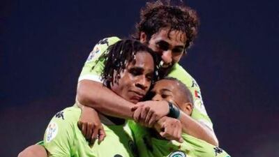 Edgar Bruno, left, celebrates with his Al Shabab teammates after scoring a goal against Lekhwiya during their Asian Champions League football match.