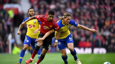 Rashford of Manchester United is challenged by Vestergaard. Getty Images