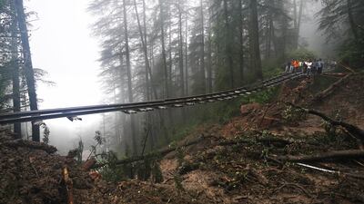 A portion of the Shimla-Kalka heritage railway track that was washed away after heavy rain in Himachal Pradesh state, India. AP