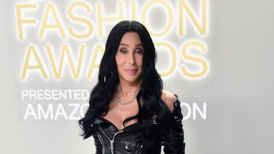 Singer and actress Cher wore a leather evening dress by Chrome Hearts.