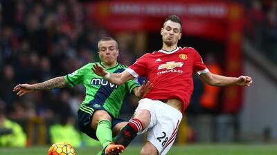 Morgan Schneiderlin of Manchester United and Jordy Clasie of Southampton compete for the ball during the Barclays Premier League match between Manchester United and Southampton at Old Trafford on January 23, 2016 in Manchester, England. (Photo by Michael Steele/Getty Images)