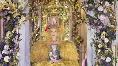 Among the more dramatic looks was this yellow feathered gown. Courtesy Dolce & Gabbana