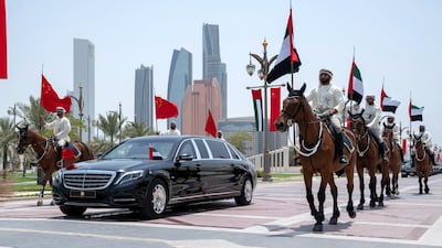 Members of the UAE Armed Forces Cavalry Division escort Xi Jinping, President of China upon his arrival at the Presidential Palace. Hamad Al Mansoori for Crown Prince Court - Abu Dhabi