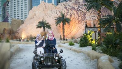 Two girls take part in the eco safari on the first day of the Mother of the Nation Festival in Abu Dhabi. Mona Al Marzooqi / The National