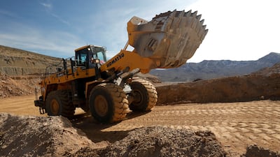 A wheel loader takes ore to a crusher at the MP Materials rare earth mine in Mountain Pass, California, January 2020. Reuters