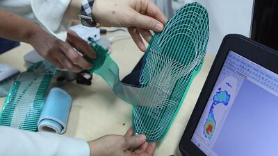 Students and staff at Khalifa University work on various research projects in the biomedical engineering program. Kenana Al Adem and Khaled Abdelraouf, both 20, have been developing a shoe sensor to alert diabetic patients of potential foot problems. March 2014. Delores Johnson / The National